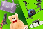 purple duffel bag, orange mini chainsaw, large stuffed bear, stationary bike, solar light