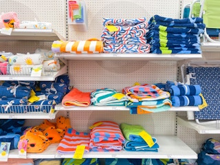 beach towels sitting on a target shelf