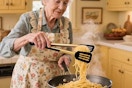 woman using tong spatula