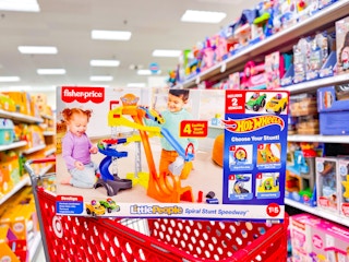 fisher-price hot wheels speedway sitting on top a target cart