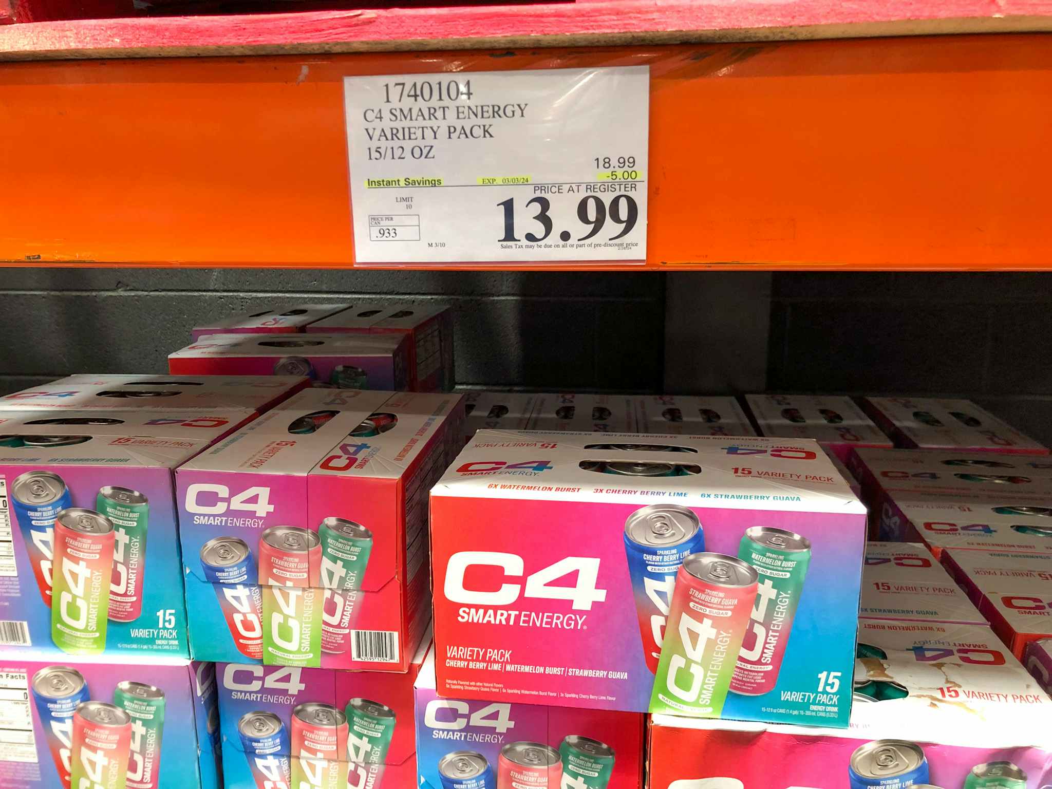 c4 energy drinks on a shelf with a $13.99 price tag