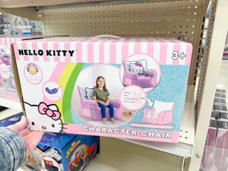 hand holding hello kitty character chair on target shelf