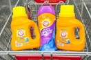 arm and hammer laundry detergent and scent beads in a cart