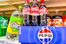 starry, pepsi, coca-cola on store shelf