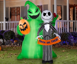 stock photo of disney the nightmare before christmas jack skellington and oogey boogey man inflatable staged in yard