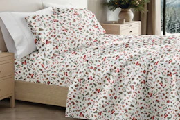 holiday sheets from Linens & Hutch on a bed 
