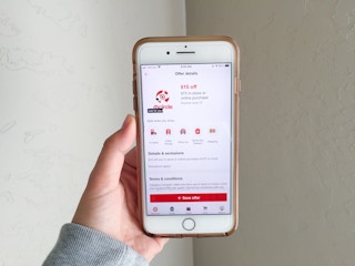 hand holding smartphone with Target app open to a coupon