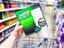 Swiffer Sweep + Mop, Dry Pads Refill held up over Walmart shopping cart
