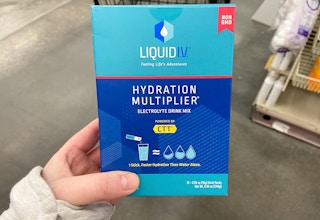 hand holding a box of liquid iv