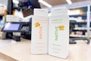 2 bottles of native body wash on the walgreens checkout counter