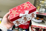 hand holding a christmas gift box