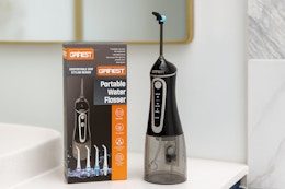 This $40 Water Flosser Is Under $10 on Amazon Right Now card image