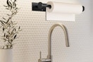 a paper towel holder on a wall