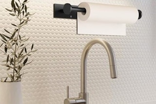 a paper towel holder on a wall