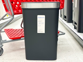 brightroom motion sensor trash can sitting in front of a target cart