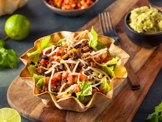 Taco Salad in a Tortilla Bowl with Beef Cheese and Lettuce