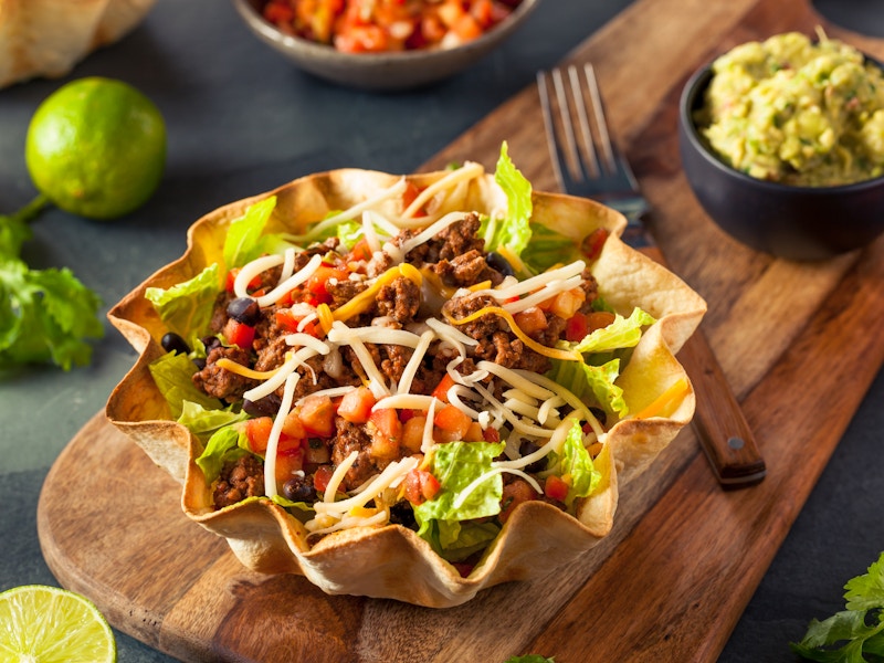 Taco Salad in a Tortilla Bowl with Beef Cheese and Lettuce