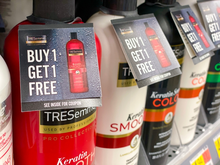 Tresemme shampoo and conditioner bottles with BOGO coupons