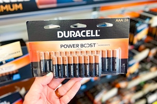 hand holding duracell batteries