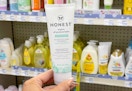 hand holding honest balm