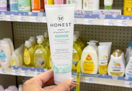 hand holding honest balm