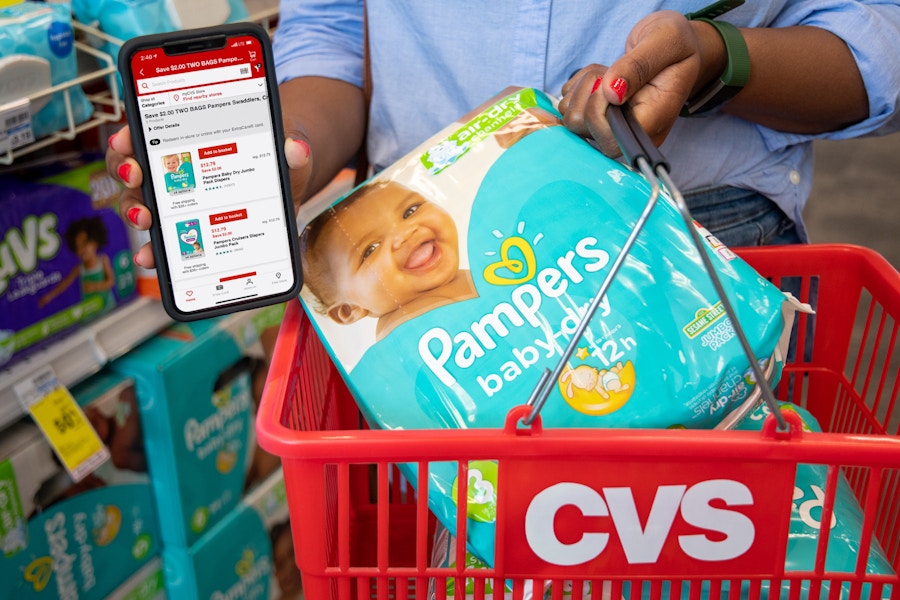 Pampers coupons on the CVS app with a basket holding two packs of pampers diapers.