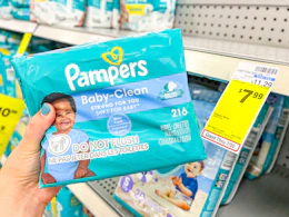 hand holding pampers wipes in cvs