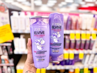 hand holding loreal elvive hair care