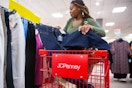 Person shopping with a red JC Penney's cart