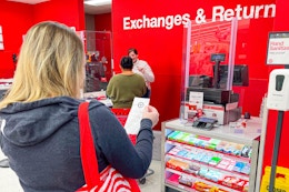 someone waiting in line for the customer service desk at Target to get a price match adjustment