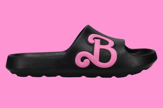 Stock image of black Women's Sandal Slides with pink Barbie logo