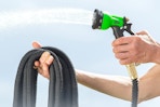 spraying garden hose