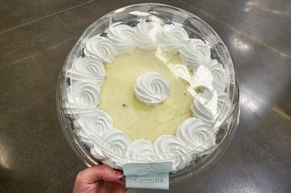 person holding a key lime pie