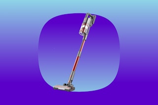 A rechargeable cordless stick vacuum, red