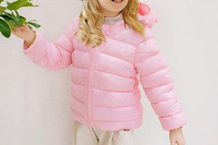 toddler wearing a pink puffer jacket