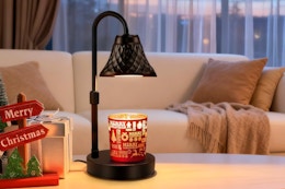 Banbanda Adjustable Candle Warmer Lamp with Timer on an accent table.