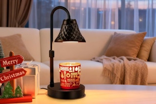 Banbanda Adjustable Candle Warmer Lamp with Timer on an accent table.