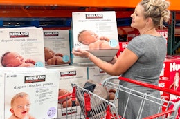 a woman shopping diapers at costco