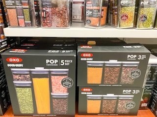a display of oxo food storage containers stacked on top of each in macys