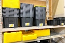 heavy duty totes sitting on a home depot shelf