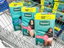 three packages of Depend underwear in a Walmart cart