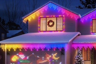 AHAWILL Icicle Lights for Outside on a house lit-up at night.