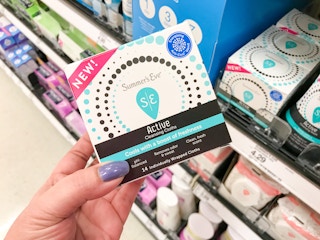hand holding summer's eve active wipes at target
