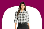 Stock image of model wearing a Time and Tru Cropped Flannel Shirt in gray plaid