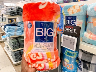 the big one plush throw in store image on shelf