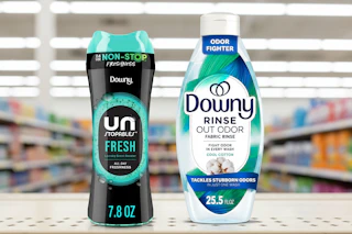 downy unstoppables and fabric rinse on a shelf