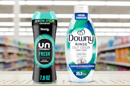 downy unstoppables and fabric rinse on a shelf
