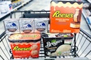 reese's, klondike and breyers ice cream in a shopping cart