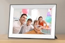 a digital picture frame on a table