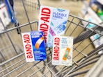 Three Band-Aid products in Walmart shopping cart